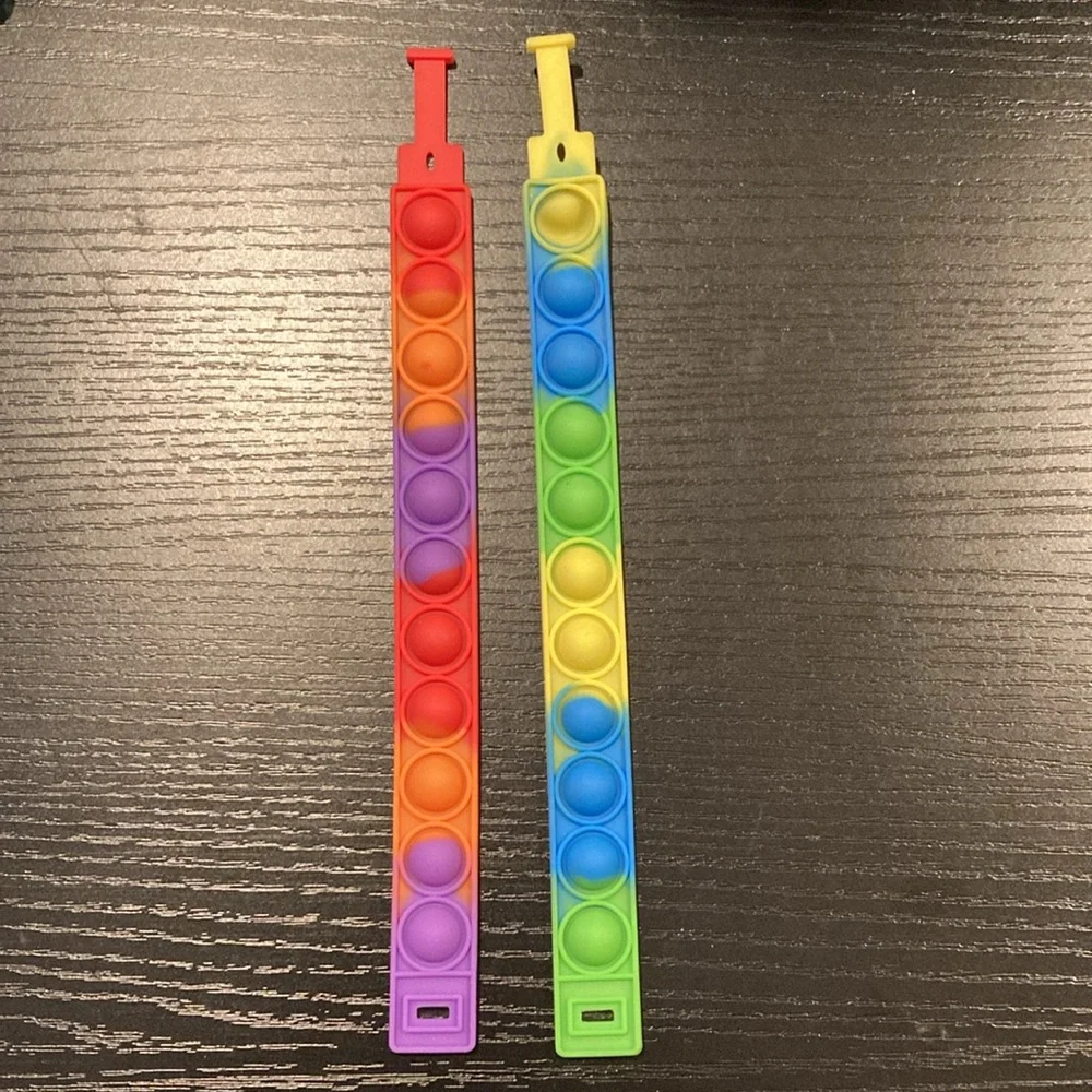 Pop-Its Set of 4 includes Glow In Dark Dinosaur New Kids Sensory Autism Fidget